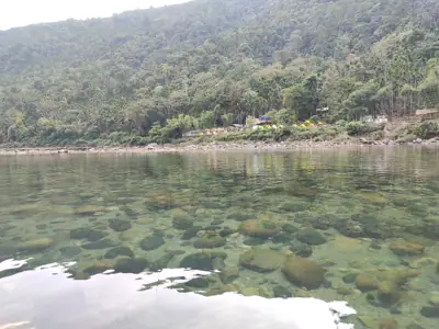 Clear water of the Umngot River at Dawki